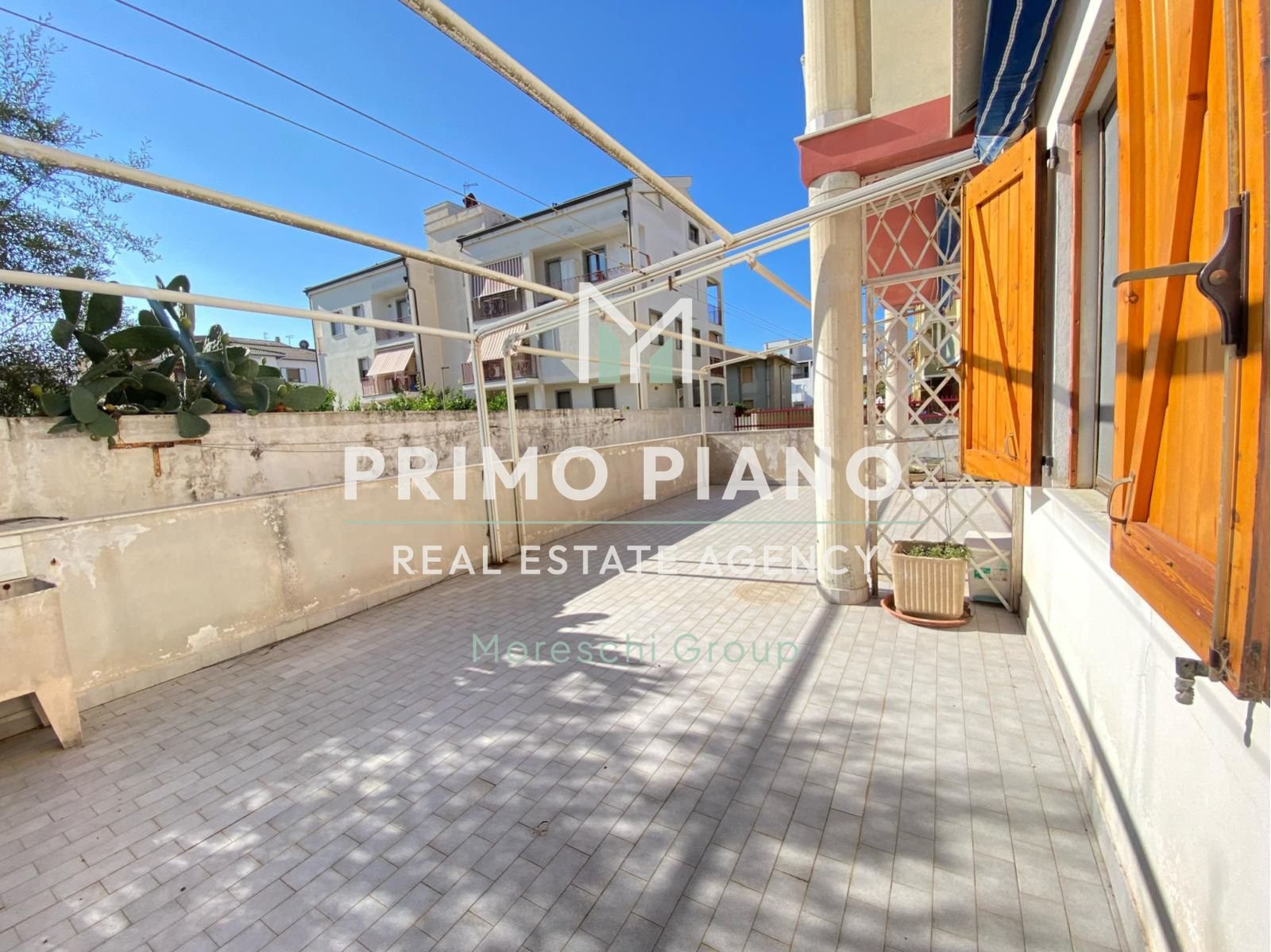 Copia di Copia di Progetto senza titolo (72) Trilocale in vendita ad Alghero, zona tranquilla vicino al mare – Con cortile privato e box