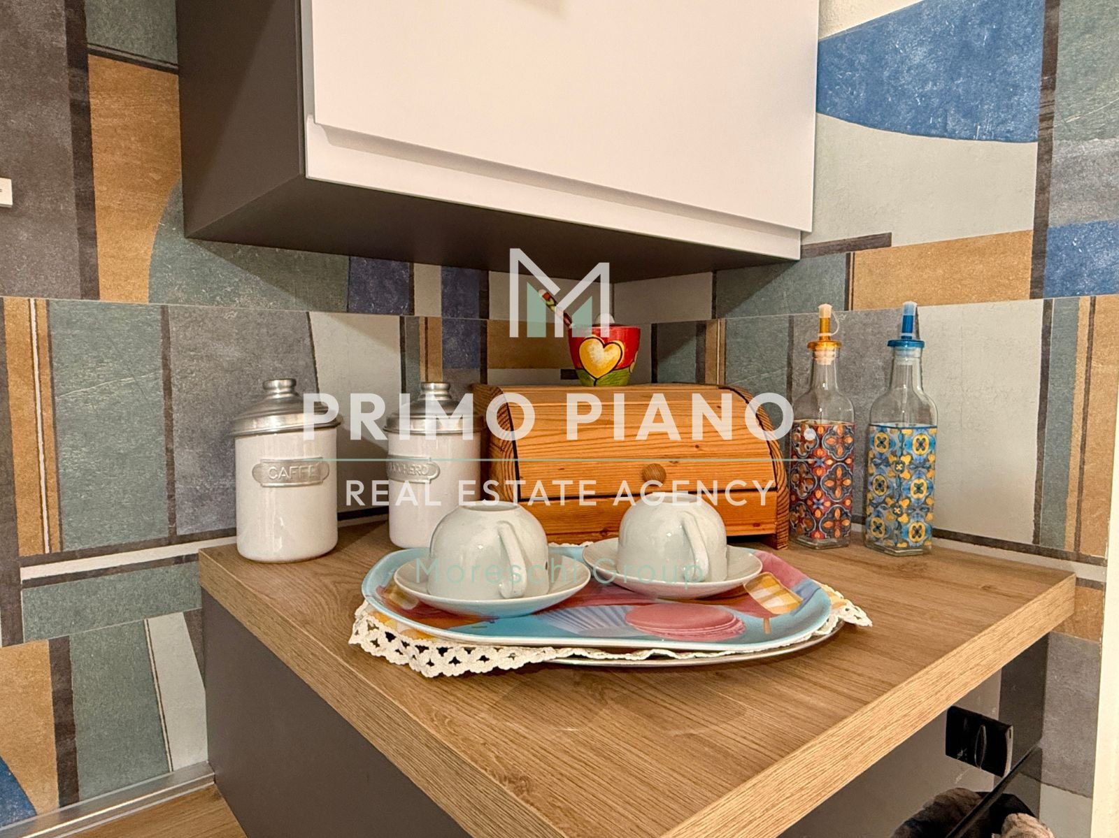 APPARTAMENTO CON DUE CAMERE E BOX AUTO IN ZONA CENTRALE