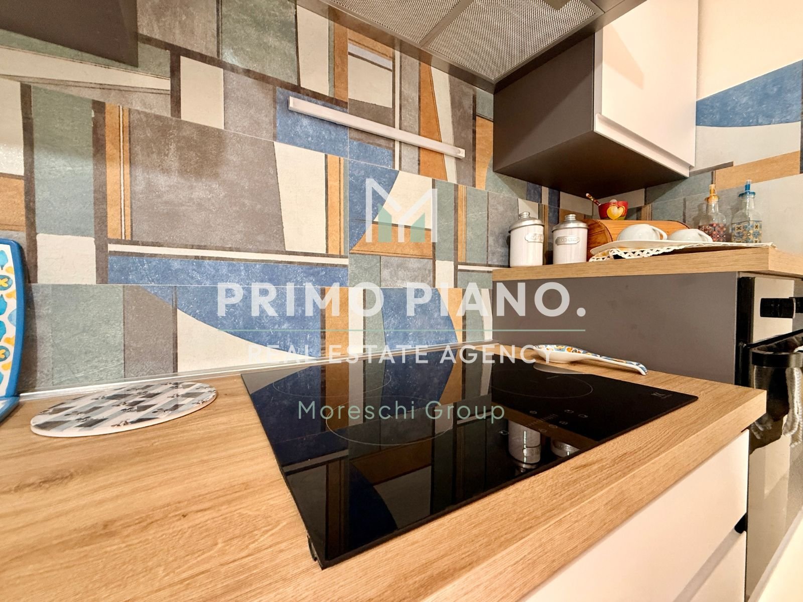 APPARTAMENTO CON DUE CAMERE E BOX AUTO IN ZONA CENTRALE