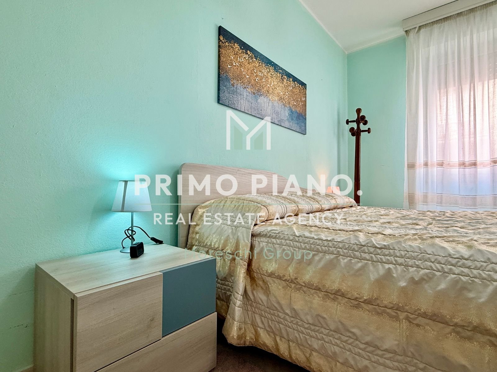 APPARTAMENTO CON DUE CAMERE E BOX AUTO IN ZONA CENTRALE